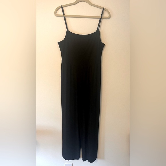 Women’s black jumpsuit with adjustable straps, stretchy black fabric, Size XL. - Picture 3 of 6